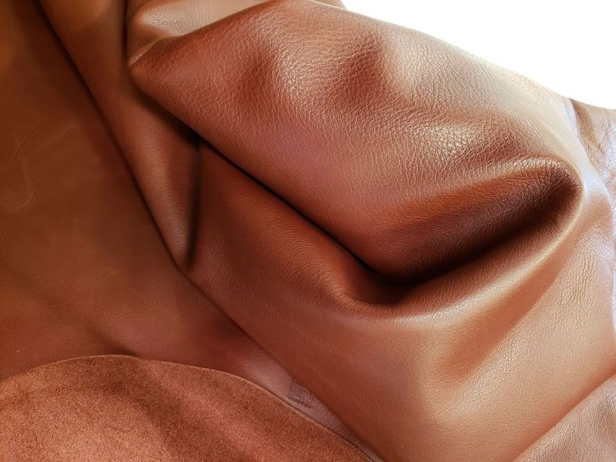 Smooth tan upholstery leather, folded