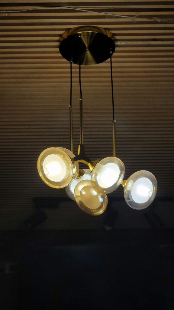 Brass chandelier with glass globes