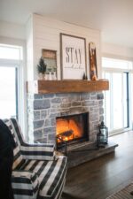 Stone fireplace with a lit fire