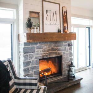 Stone fireplace with a lit fire