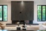 Dark marble fireplace wall