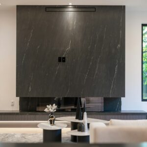 Dark marble fireplace wall